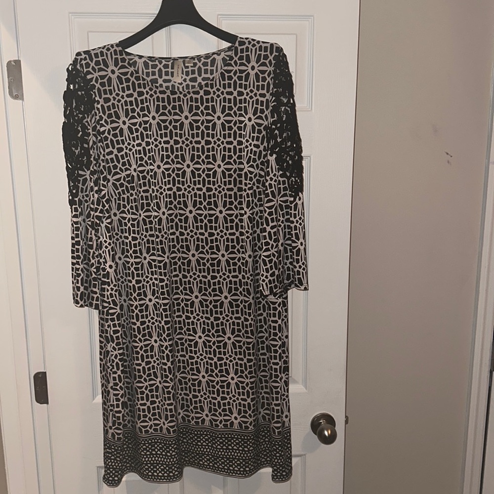 Black and white, casual dress. Can be dressed up down. A good look for church.